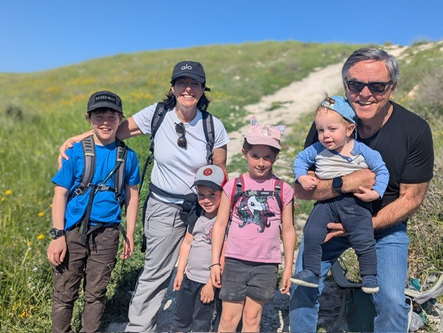 Laura with her husband Rick and their grandchildren on a hike in Israel earlier this year.