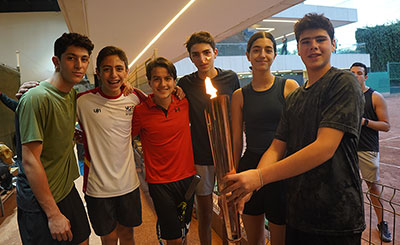 Mexico’s Maccabi tennis team carries the torch through our CDI community center, as it makes its way through each delegation attending the Maccabi Games.