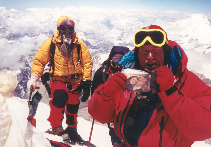 Alan Hinkes OBE on the summit of Mount Everest in 1996. Three decades later, he continues to inspire others to push their limits through the challenge of mountaineering.