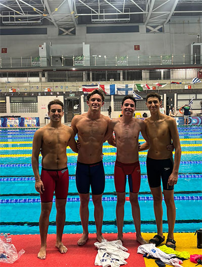 Poolside, Mexico swimmers Alan Haras, Alberto Tawil, Gabriel Feldman, and Alan Dabbah get ready to compete at the Maccabiah Games.